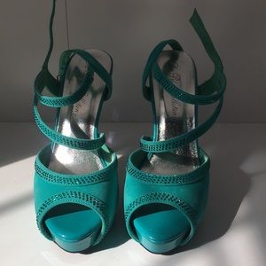 Teal platform sandals with sparkly straps